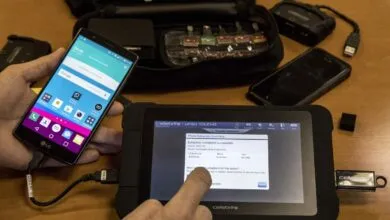 Cellebrite UFED Touch2 device extracting data from an LG smartphone.