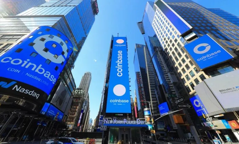 Coinbase billboards in Times Square, New York City, on a sunny day.
