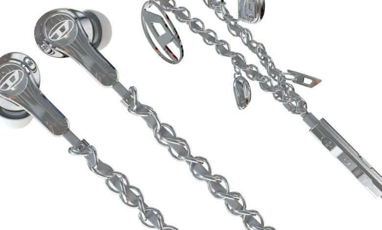 Shiny silver Diesel earbuds with chain detail for a stylish look.