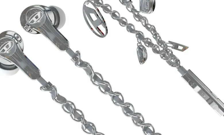 Shiny silver Diesel earbuds with chain detail for a stylish look.