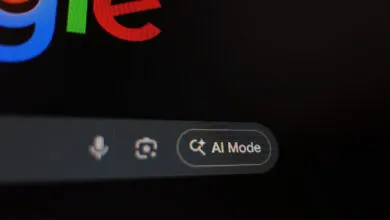 Close-up of a computer screen showing the Google logo and an 'AI Mode' button.