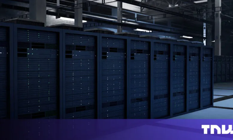 Rows of server racks with blinking lights in a data center.
