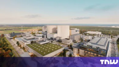 Rendering of a large, modern industrial complex with green roofs and cylindrical structures.