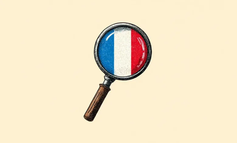 Magnifying glass showing the French flag, blue, white, and red.