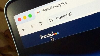 Fractal Analytics website displayed on a laptop screen.