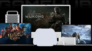 Gaming setup featuring laptops, desktop, and monitor displaying Baldur's Gate, Black Myth: Wukong, and God of War.