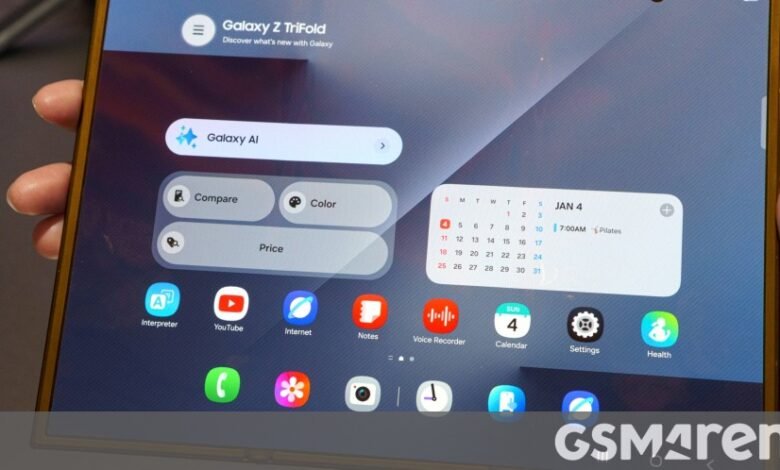 Samsung Galaxy Z TriFold tablet showing app icons and calendar widget.