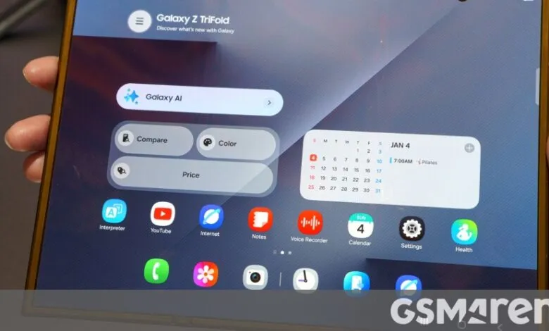 Samsung Galaxy Z TriFold tablet showing app icons and calendar widget.
