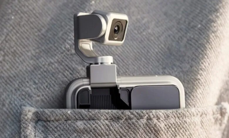 Smartphone with robotic camera in pocket, silver and black.