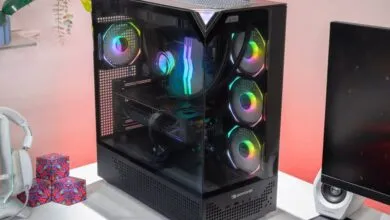 iBuyPower Element 9 Pro gaming PC with RGB fans and glass side panel.
