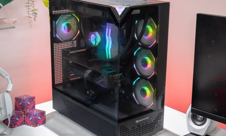 iBuyPower Element 9 Pro gaming PC with RGB fans and glass side panel.