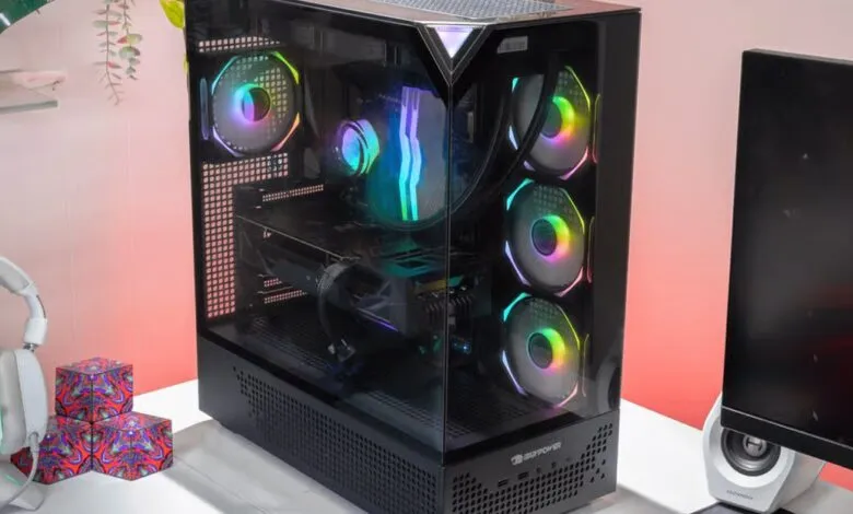 iBuyPower Element 9 Pro gaming PC with RGB fans and glass side panel.