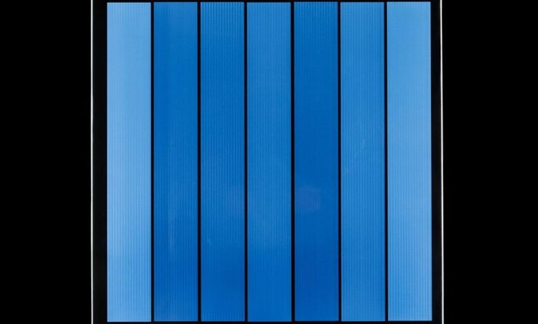 Abstract image of vertical blue panels with varying shades and textures.