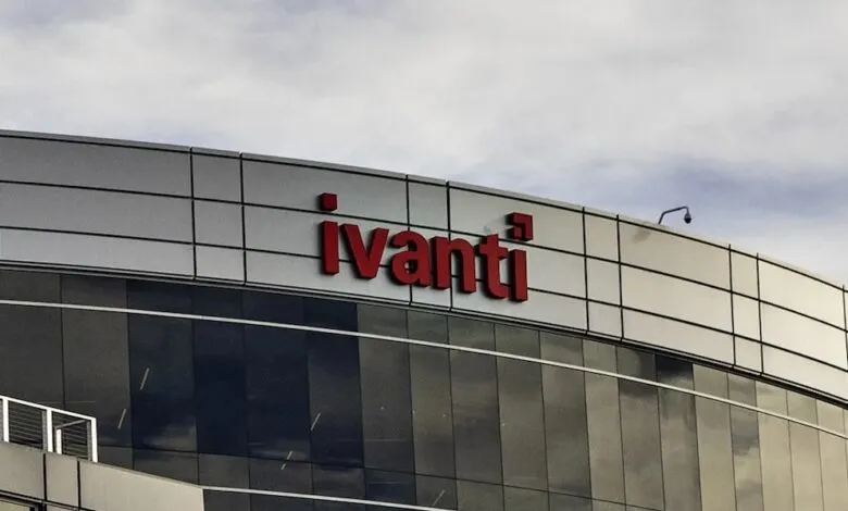 Ivanti logo in red on modern building with reflective glass and cloudy sky.