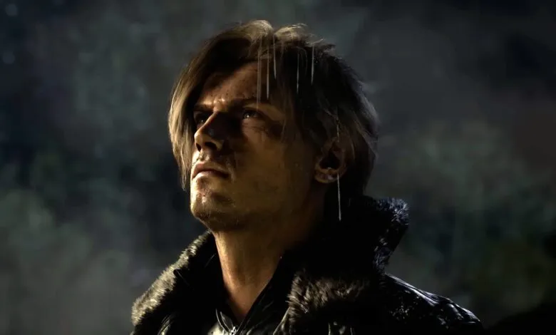 Close-up of a man with wet hair looking upwards.