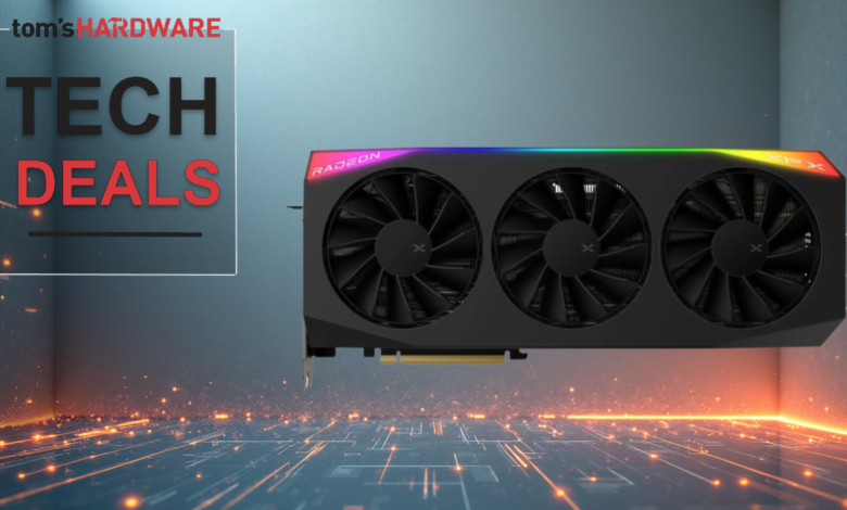 XFX Radeon RX 7900 XTX graphics card with three fans and RGB lighting.