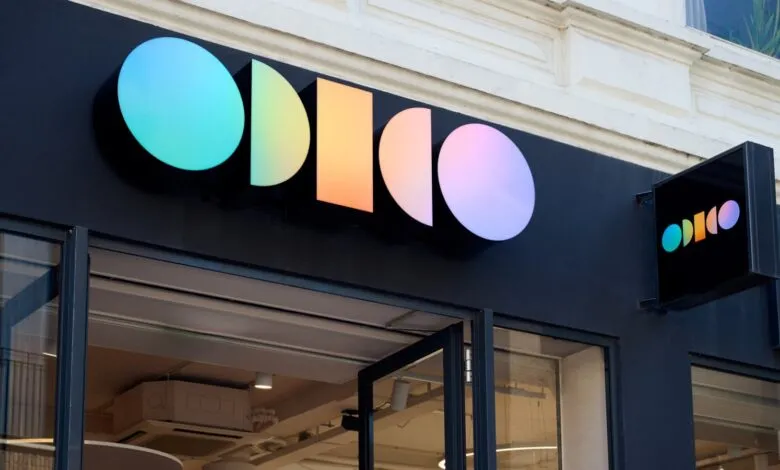 Odido store front with colorful logo sign above the entrance.