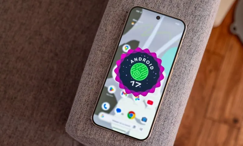 Smartphone displays Android 17 logo on gray textured surface.