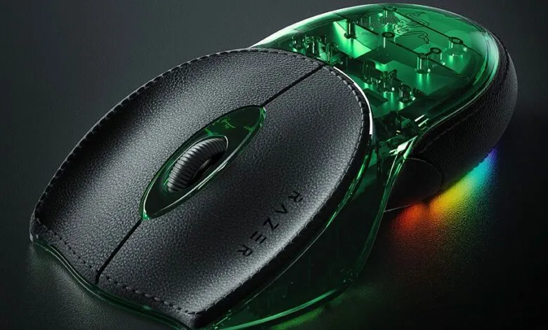 Close-up of a Razer Boomslang gaming mouse with a transparent green shell.