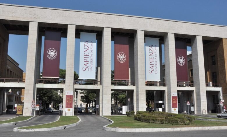 Entrance to Sapienza University of Rome with banners.