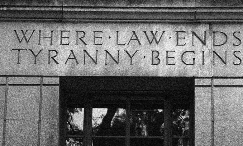 Stone building with inscription: Where law ends, tyranny begins.