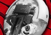 Close-up of a Romo robot head showing internal components.