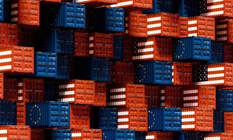 Stacked shipping containers with US and EU flag designs.