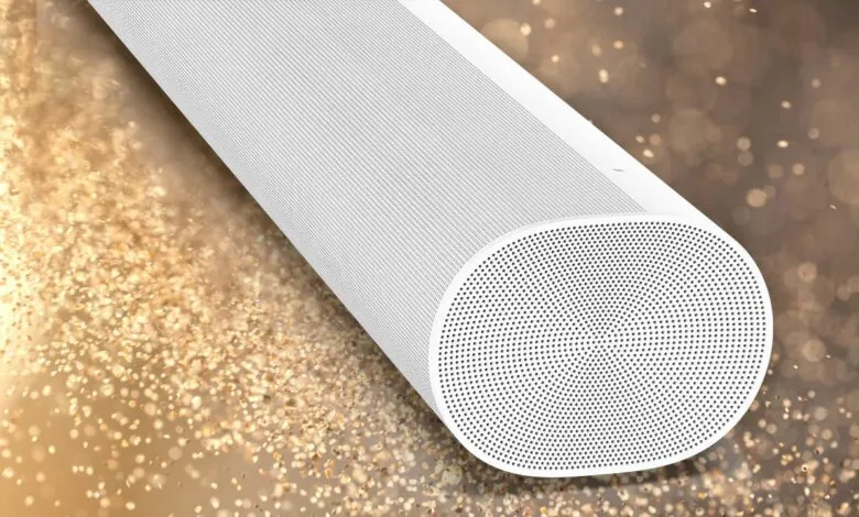 Close-up of a white Sonos soundbar against a bokeh background.