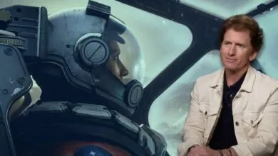 Todd Howard sits beside a Starfield astronaut in a promotional image.