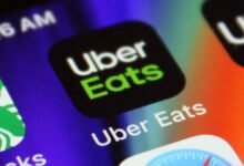 Uber Eats app icon on a smartphone screen, close-up view.