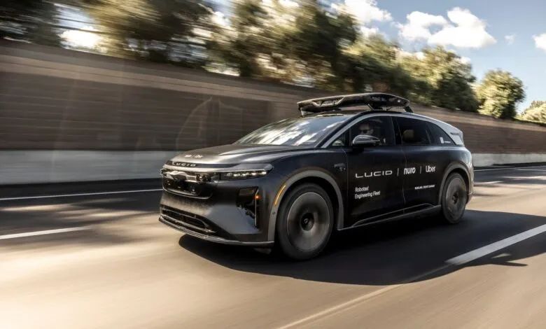 Lucid Gravity prototype vehicle driving on highway, autonomous technology.