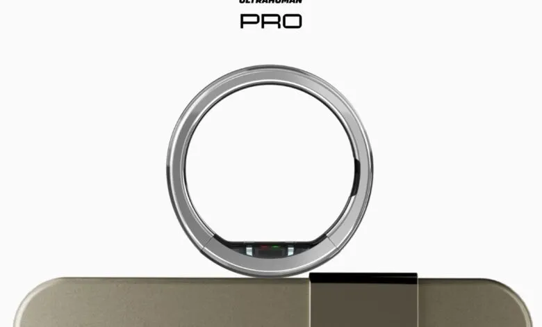 Ultrahuman Ring Pro on charging dock, silver ring, minimalist design.