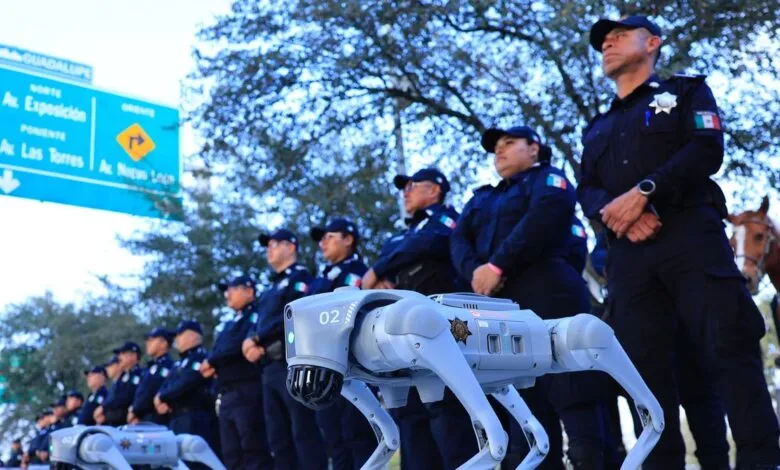 Line of Mexican police officers and robotic dogs stand at attention outdoors.