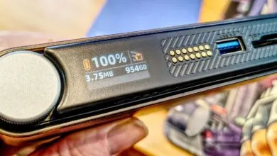 Portable SSD drive showing 100% capacity and USB 3.0 port.