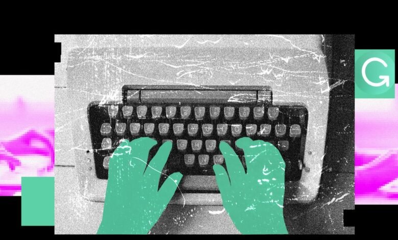 Hands typing on a vintage typewriter with a Grammarly logo overlay.