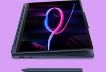 Lenovo Yoga 9i 2-in-1 laptop with stylus on a purple background.
