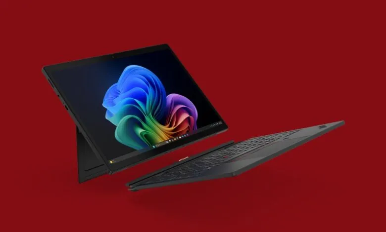 Lenovo ThinkPad X13 Detachable tablet with keyboard on red background.