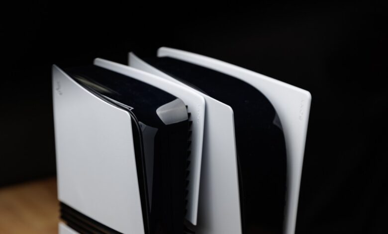 Close-up of a PlayStation 5 console against a black background.