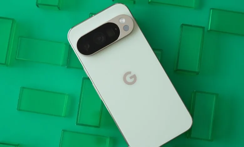 Back of a Google Pixel phone with camera bar on a green background.