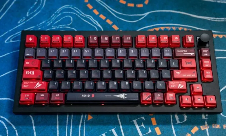 Custom Keychron Q1 Max mechanical keyboard with red and grey keycaps.