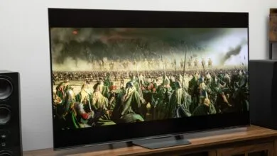 Hisense U7SG TV displaying a battle scene with many soldiers and horses.