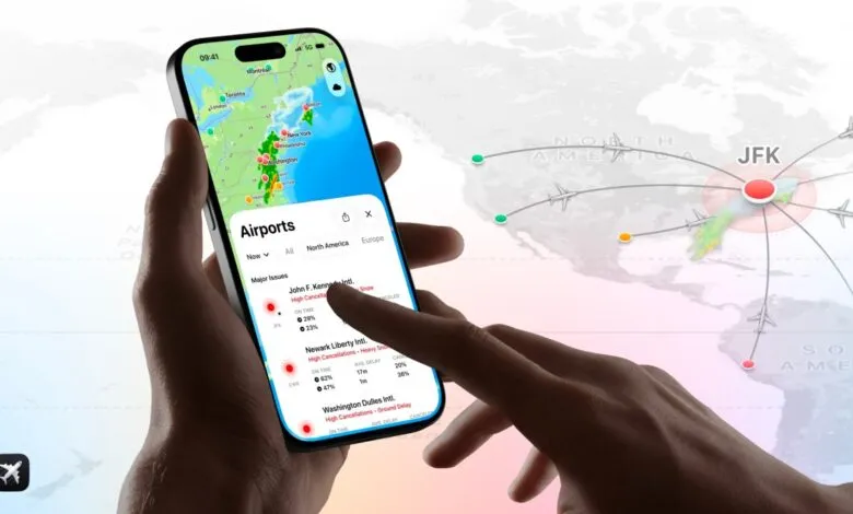 Person using flight tracking app on phone showing airport delays and cancellations.