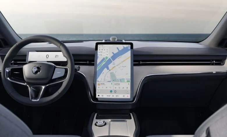 Volvo EX90 interior featuring a large central touchscreen display and minimalist design.
