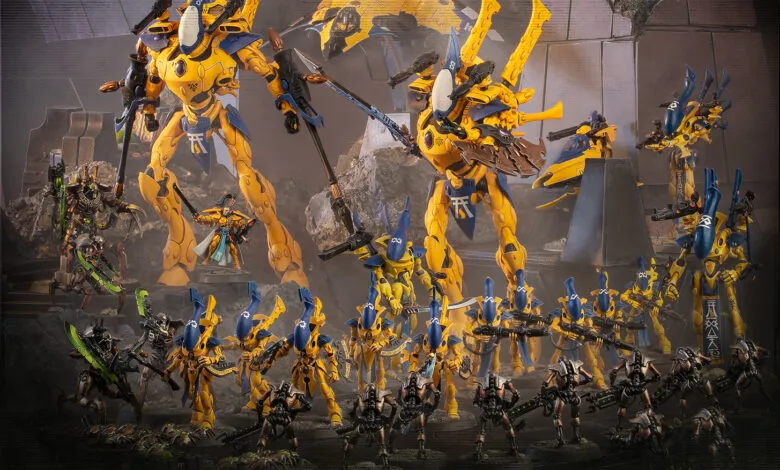 Warhammer 40k Eldar and Necron miniatures in dynamic battle scene.