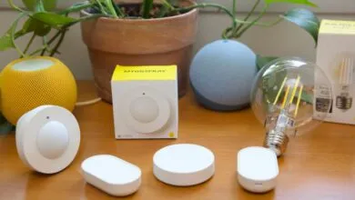 Assortment of smart home devices including sensors, bulbs, and speakers.
