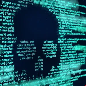 Skull outline formed by lines of green computer code on a dark background.