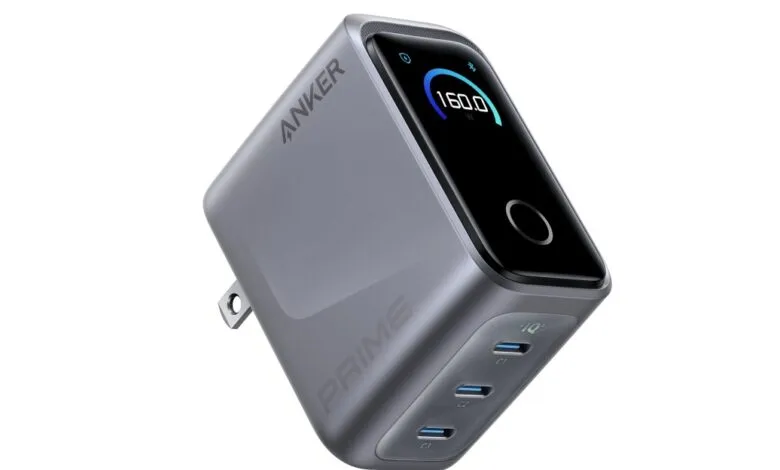 Anker Prime 160W charger with smart display showing 160.0W output.