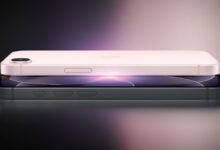 Two iPhones stacked: a pink one on top of a gray one.