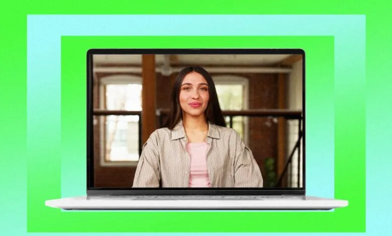 Woman on laptop screen with bright green and blue background.