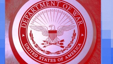 Department of War seal featuring an eagle, stars, and arrows.